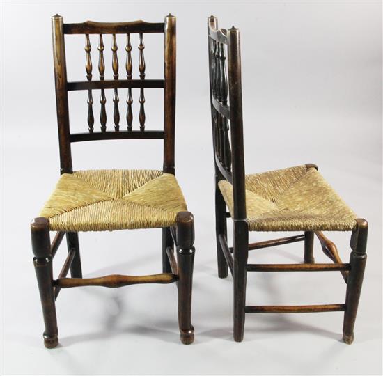 Harlequin set of six Country oak spindle back rush seat dining chairs(-)